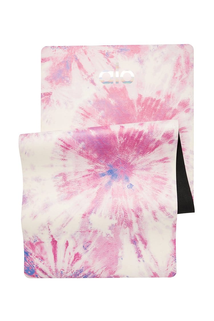 Alo Yoga's best selling Warrior yoga mat, a non slip yoga mat in pink tie dye color.