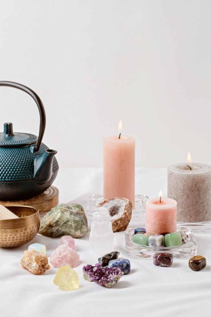 Healing crystals and candles for yoga room.