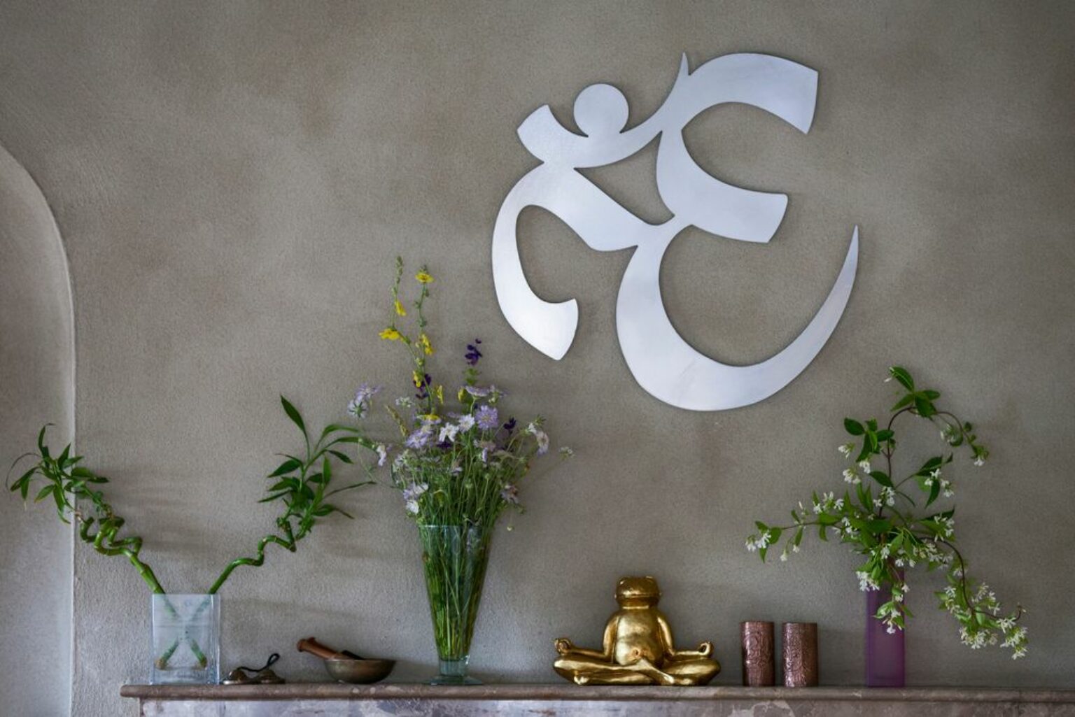 What You Need To Know About The Om Symbol Meaning + How To Wear, Tattoo, & Pronounce It The
