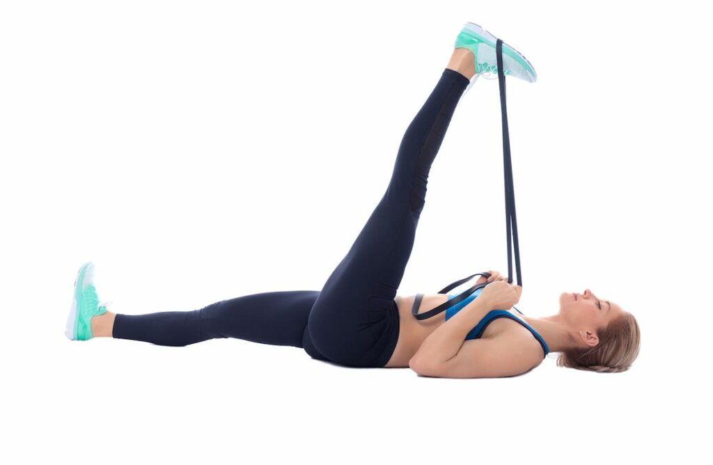 Yoga: Supine one leg hamstring stretch with strap