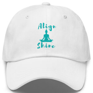White yoga trucker hat with a graphic print design on the front that says align and shine.