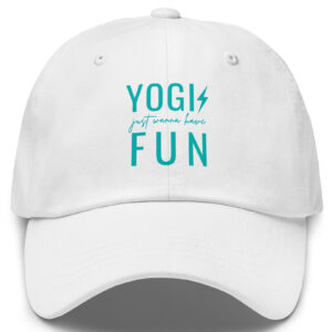 White yoga trucker hat with a graphic print design on the front that says yogis just wanna have fun.