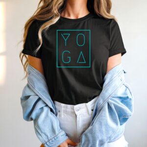 Female yogi with long hair wearing a casual black yoga graphic print t-shirt with the word yoga printed in a modern minimalist font with a box outline.