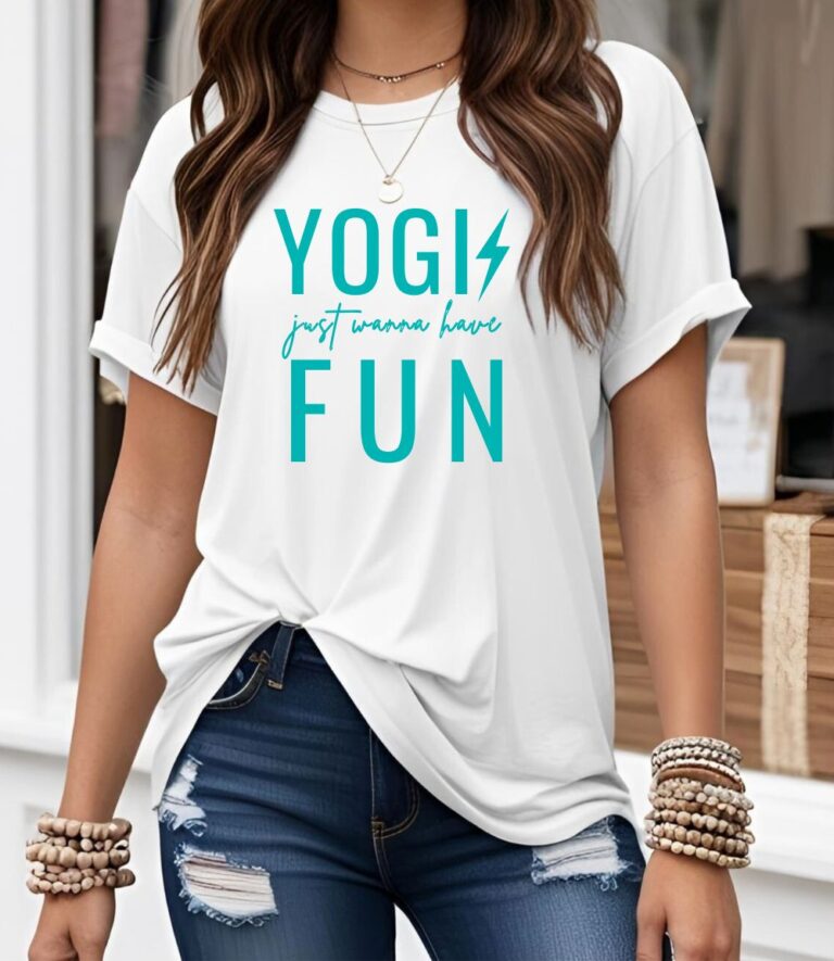 Female yogi with long hair wearing a casual white yoga graphic print t-shirt that says Yogis Just Wanna Have Fun.