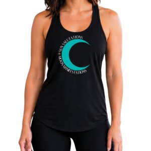 Female yogi with brunette hair wearing a black racerback yoga tank top that says sun salutations moon manifestations.